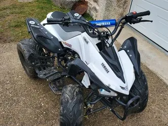 quad 125