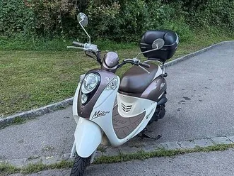 sym mio 100