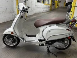 excellent vespa primavera 150 with many add-ons