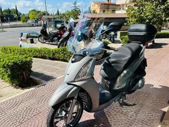 kymco people gt 300 passaggio garanzia tagliando