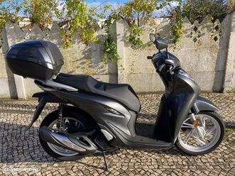 HONDA honda-sh-125i-smart-key-top-box-servio-0km tweedehands - De Parking