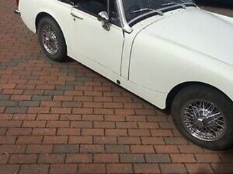MG MIDGET 1973-mg-midget-desirable-round-wheel-arch-model-wire-wheels ...