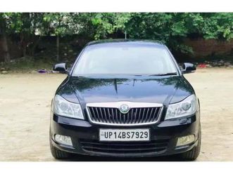 skoda laura l&k 2.0 tdi at 2012