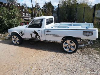 504 v20 pickup 2.3turbo d boite 5 au volant