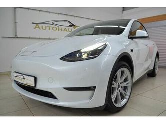 tesla model y long range dual motor awd ~ leder