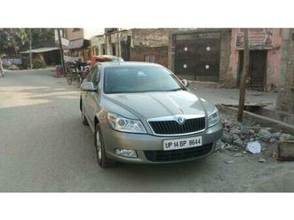 skoda laura ambition 2.0 tdi cr mt 2012