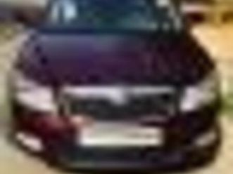 skoda laura ambition 2.0 tdi cr mt 2013