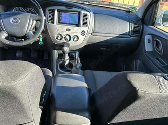 se vinde mazda tribut