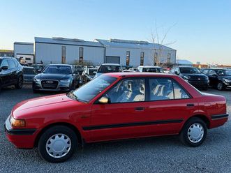 mazda 323 *** 1.hand *** nur 68411 km *** tüv neu
