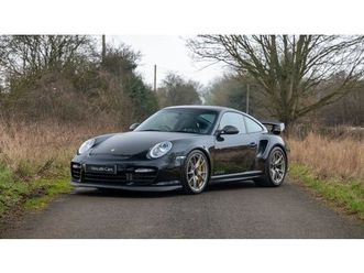 2010-porsche-911-noir-manuel-6-vitesses-conduite-a-droit