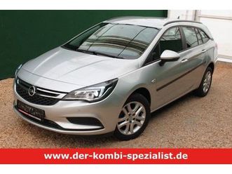 opel astra sports tour.- benzin + cng, navi/pdc/1.hd.
