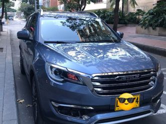 dirección mecánica, encendido automático, 7 pasajeros