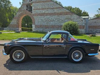 triumph tr5/ 250 mit surrey top und soft top