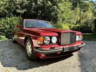 6.75i v8 lwb auto. red pearl excellente conditions