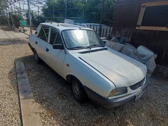 vînd dacia 1410 an 2003