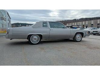 coupe deville. kun 22.500 miles. meget pen.