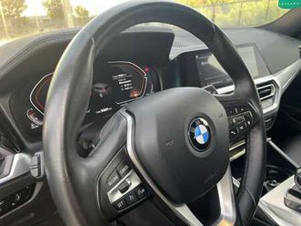 318d touring mhev 48v luxury auto