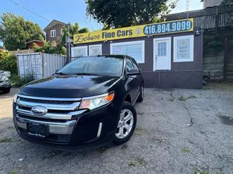 2014 ford edge sel w/navi/pan.roof/leath 416-894-9099 brian