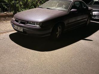 opel calibra v6 bj 96 – „nordik violett metallic“, mit zubehör