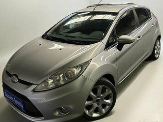 ford fiesta ghia / 1.4 tdci 70 cv / carnet d'entretient complet / régulateur de vitesses / radar de recul / jantes / clim / etc ...