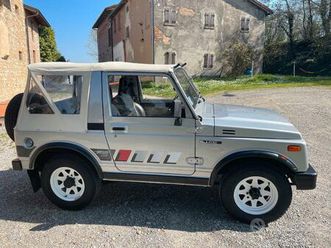 suzuki sj 413 targa oro + rivista 4x4