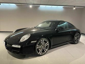 carrera coupé pdk black edition - book service