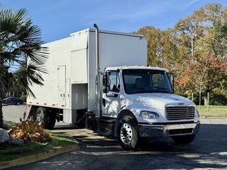 used 2011 freightliner m2106 20-foot cube van with cummins engine and shredder setup