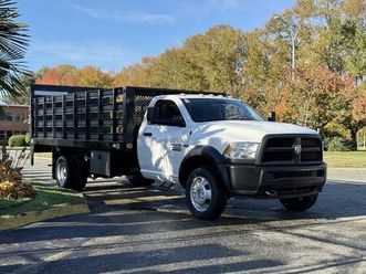 used 2015 ram 4500 flat deck truck with waltco lift gate and 16-foot deck