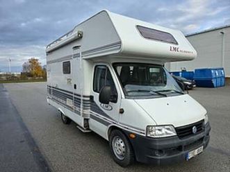 lmc caravan liberty 580 *ac bodel *8000 mil