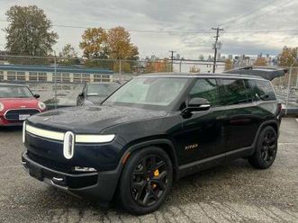 2023 rivian r1s. lady owner. low kms!
