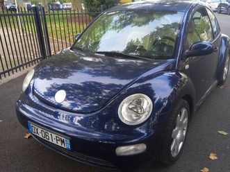 volkswagen new beetle 1.6i 102 ch carat
