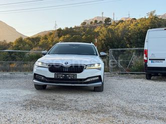 skoda superb combi 2.0 tsi dsg 4x4 scout