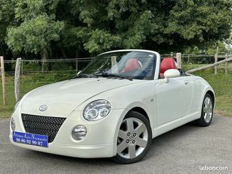 daihatsu copen roadster/coupe 1.3l 87 ch serie “pionneer” blanc nacré/cuir rouge