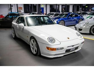 superbly presented uk-supplied 968 coupe in solid white with metropole blue leather