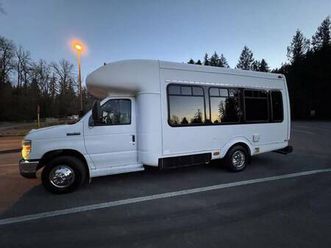 2011 ford e450 15 passenger bus w/wheelchair lift......