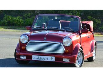 1995 rover mini donkerrood manuel conduite à gauche in pa...