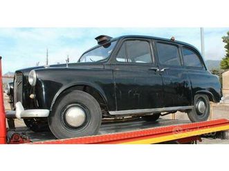 2 taxi inglesi fx4 d 1962