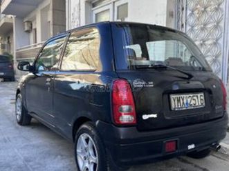daihatsu cuore 2001 black line