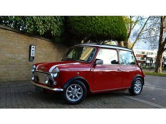 1999 rover mini rouge manuel, 4 vitesses conduite à droit...