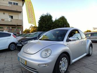 VOLKSWAGEN NEW BEETLE vw-new-beetle-1-4-top
