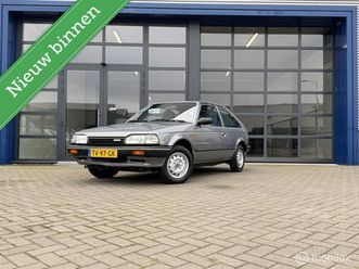 mazda 323 - 1.3 lx h4 org. nl nette staat