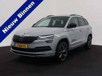 skoda karoq 1.5 tsi act sportline business pano | led | cruise | navi | stoelverw. | trekhaak | lmv 10-2020 135.873 km