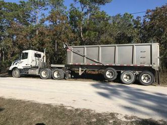 09 volvo daycab & 2022 trailstar end dump trailer