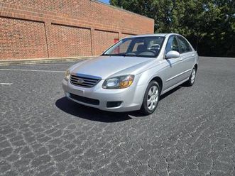 2009 kia spectra ex . ... one owner .. clean title .... low miles
