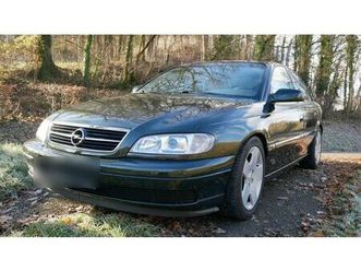 opel omega - zeitlose eleganz in dunkelgrün