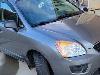2012 kia rondo - 2 sets rims/tires, 133,800km