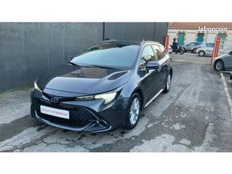 corolla xii touring sports 1.8 hybride 140 pro dynamic business + programme beyond zero academy - 1ère main