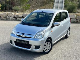daihatsu cuore 1.0 70 chevaux - clim - 2009