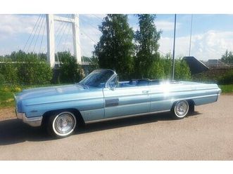 oldsmobile ninety-eight starfire cab 6.5 v8 hydra-matic