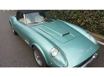 1965 extremely difficult to tell which is which ( ferrari...